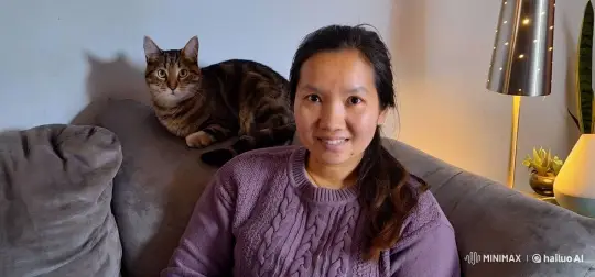 Woman Calmly Smiles as Cat Exhales Fire – AI Generated Video | Hailuo AI