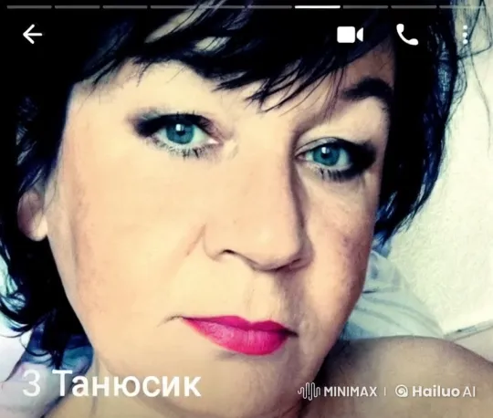 Woman Sipping Drink in Close-Up with Blurred Background – AI Generated Video | Hailuo AI