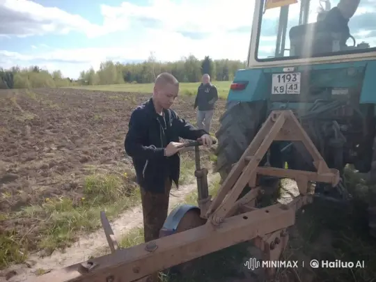 Person Slapped After Fumbling With Tractor Mechanism – AI Generated Video | Hailuo AI