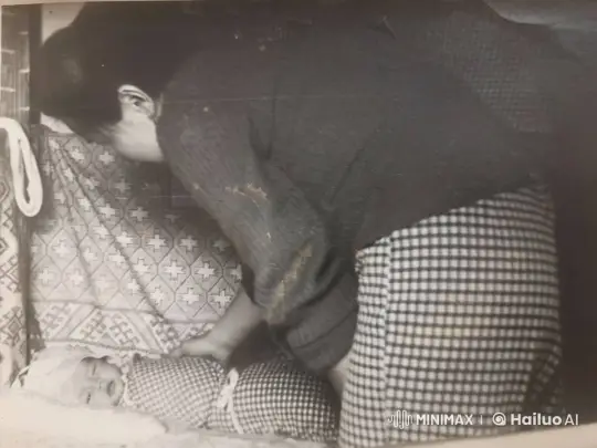 Affectionate Moment: Tender Kiss on Sleeping Child – AI Generated Video | Hailuo AI
