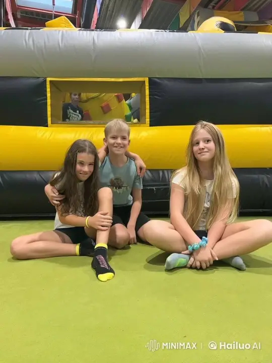 Children Experience Gravity-Defying Joy on Inflatable Play Structure – AI Generated Video | Hailuo AI