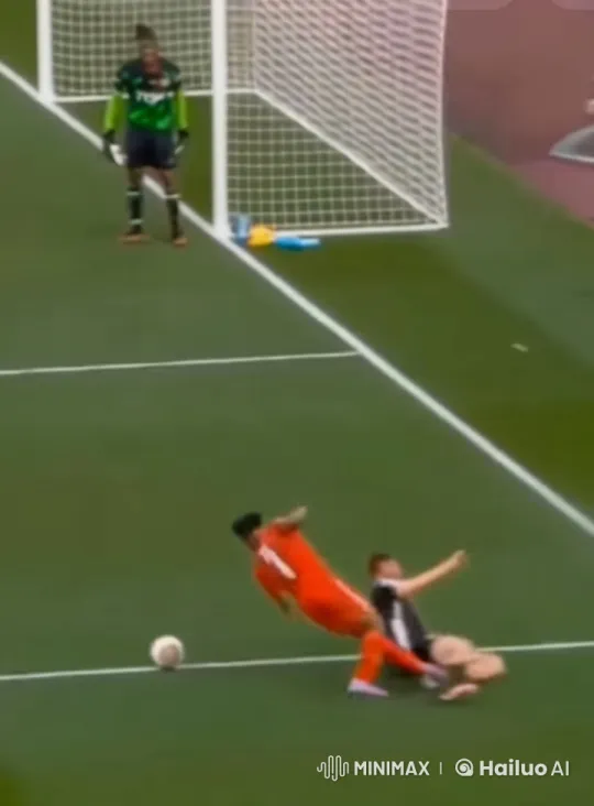 Intense Soccer Tackle Near Goal Line – AI Generated Video | Hailuo AI