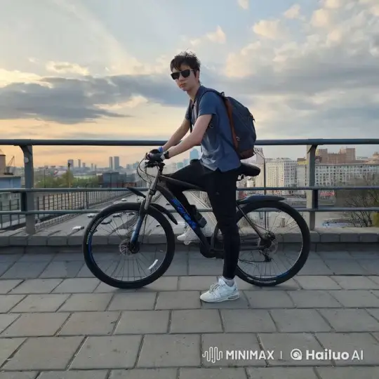 Biker performs a backflip with his bike in a cityscape. – AI Generated Video | Hailuo AI