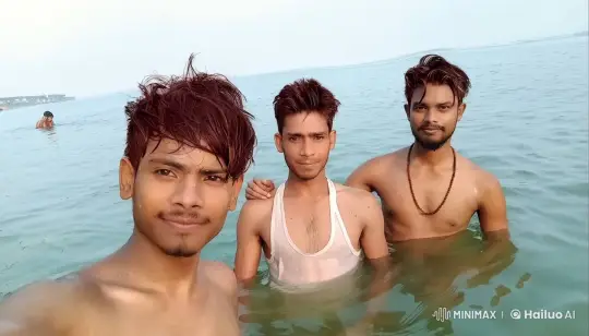 Young Men Show Affection with Cheek Kisses in Water – AI Generated Video | Hailuo AI