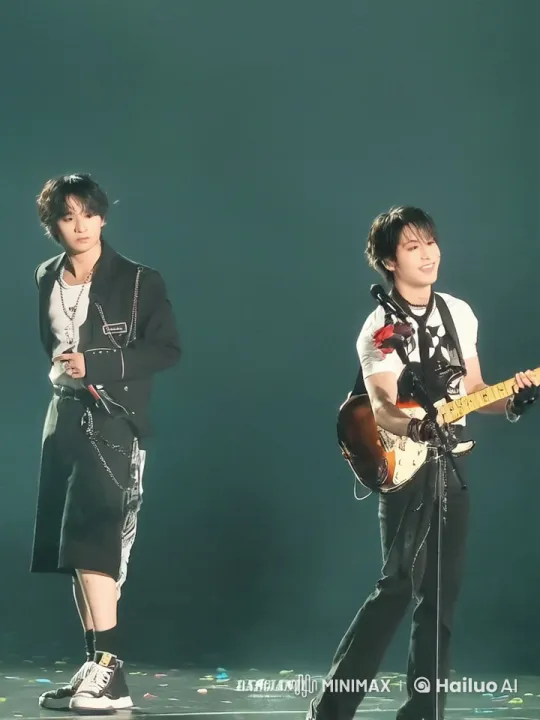 Two Young Men Share a Passionate Moment on Stage – AI Generated Video | Hailuo AI