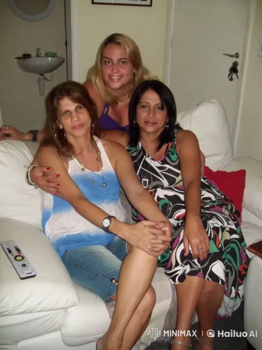 Three Women Chatting on a Couch in Cozy Living Room – AI Generated Video | Hailuo AI