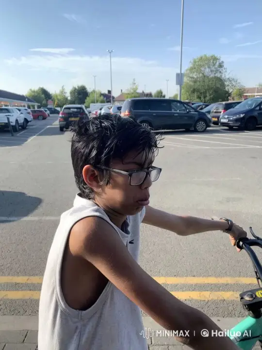 Young Person Holding Bicycle in Parking Lot – AI Generated Video | Hailuo AI