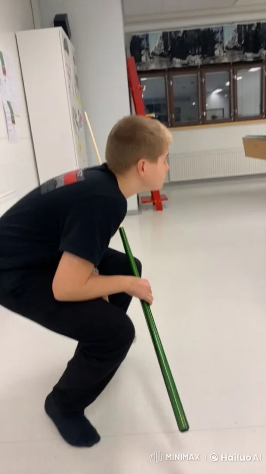 Boy Sticks Out Tongue, Holds Green Stick in Static Room – AI Generated Video | Hailuo AI