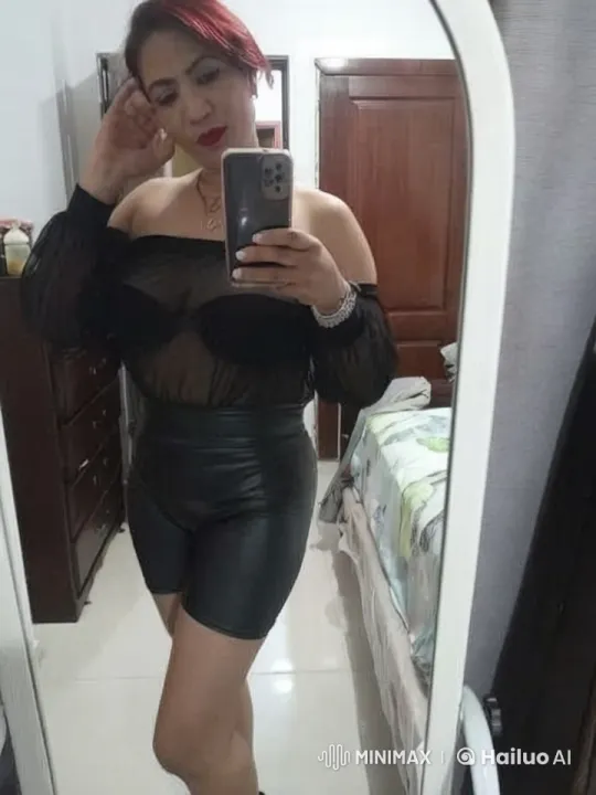 Woman Taking Selfies in Bedroom with Mirror – AI Generated Video | Hailuo AI