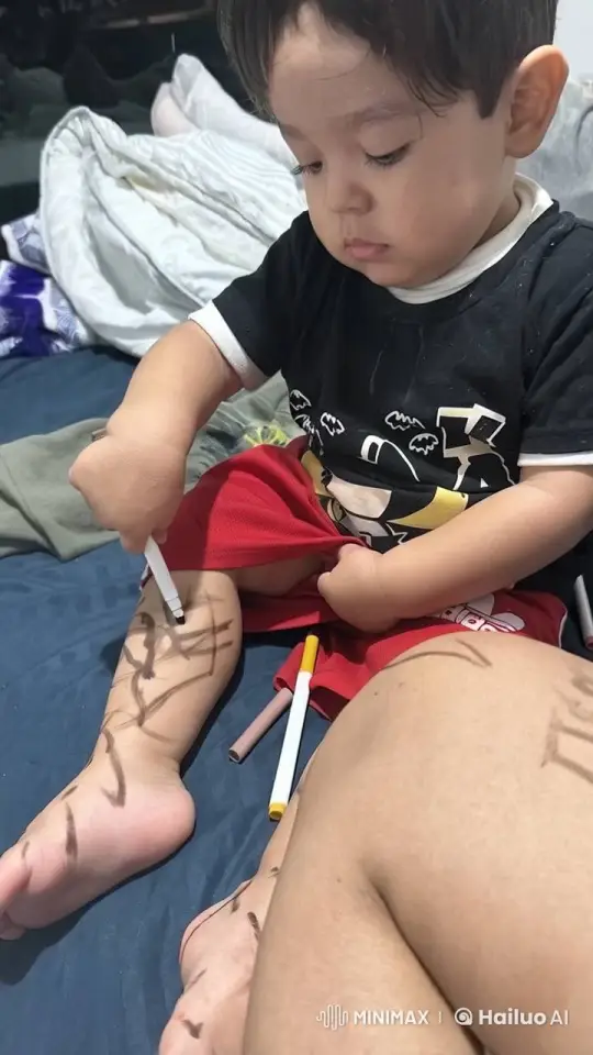 Toddler Enjoys Creative Play with Markers on Legs – AI Generated Video | Hailuo AI