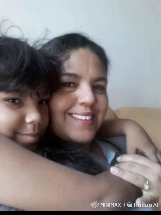 Mother and Child Embrace in Tender Moment – AI Generated Video | Hailuo AI