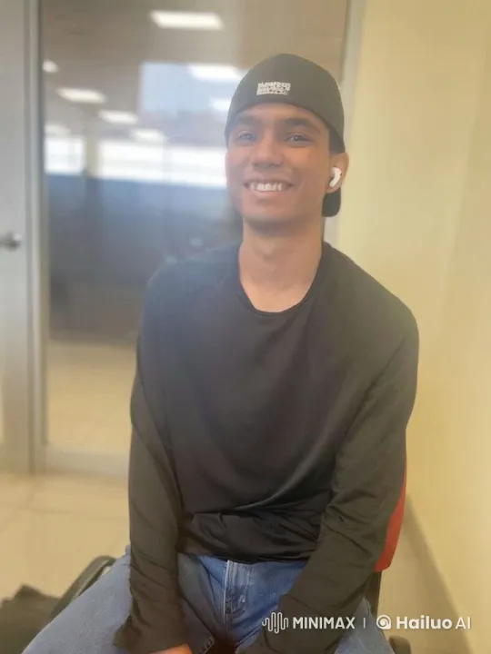 Young Man in Cheerful Mood Leaves Office – AI Generated Video | Hailuo AI