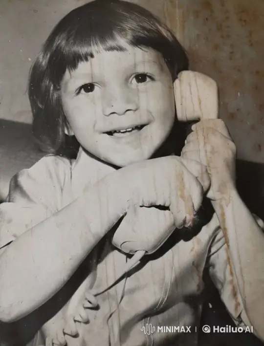 Child's Joyful Moment with Vintage Telephone – AI Generated Video | Hailuo AI