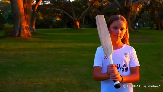 Young Cricketer in Golden Hour Park Scene – AI Generated Video | Hailuo AI