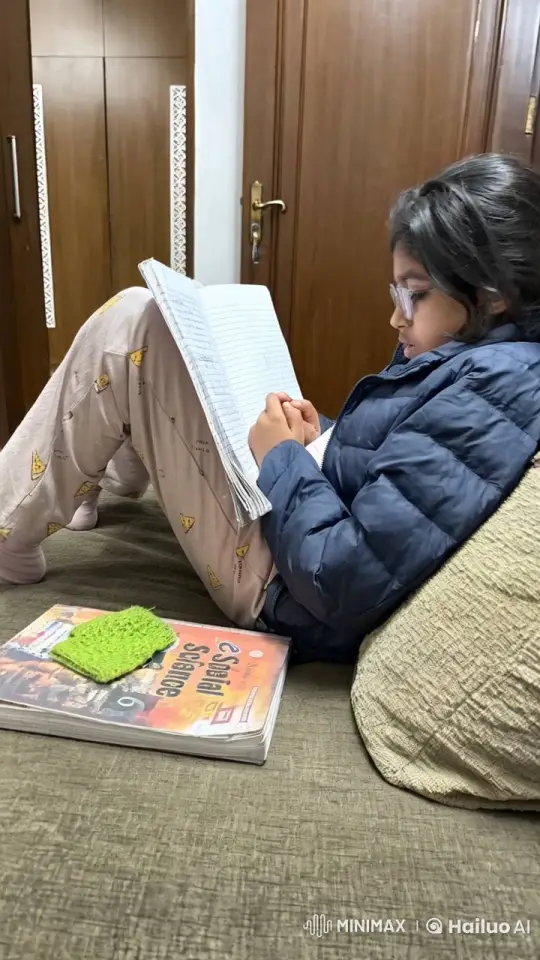 Young Girl Studies Amid Festive Home Decor – AI Generated Video | Hailuo AI