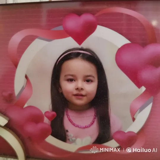 Young Girl in Heart-Themed Scene with Gentle Animation – AI Generated Video | Hailuo AI