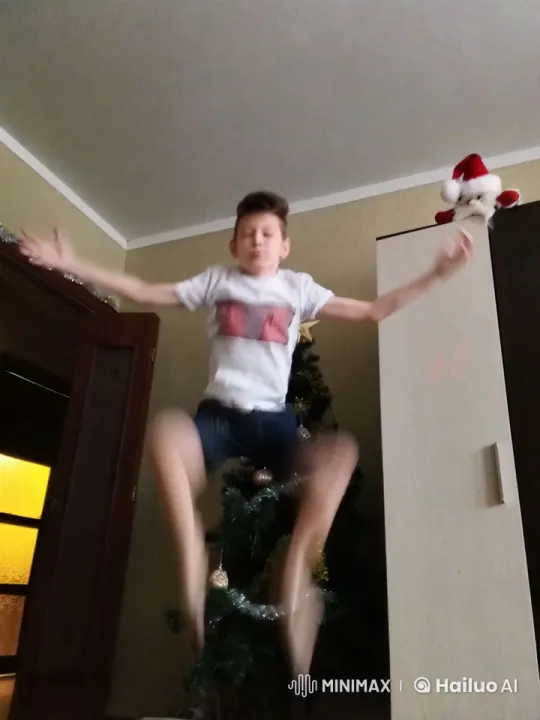 Boy Flexes Muscles, Kids Play, Christmas Cheer Fills Room – AI Generated Video | Hailuo AI
