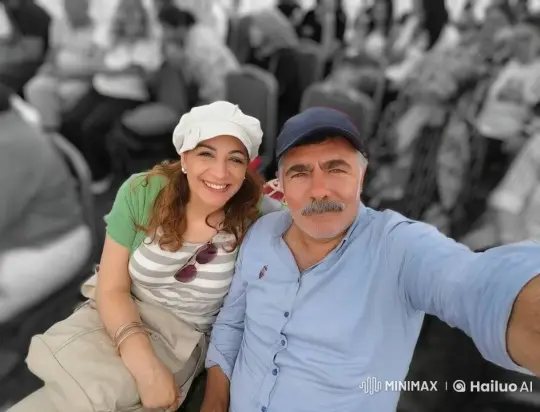 Couple's Colorful Embrace in Monochrome Background – AI Generated Video | Hailuo AI