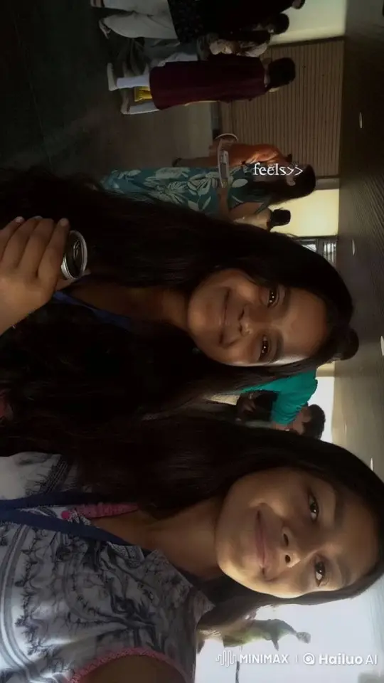 Young Women Share Affectionate Moment in Animated Video – AI Generated Video | Hailuo AI
