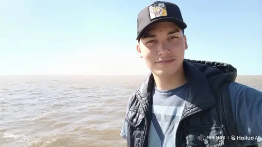 Young Angler Awaits Catch by Serene Water – AI Generated Video | Hailuo AI