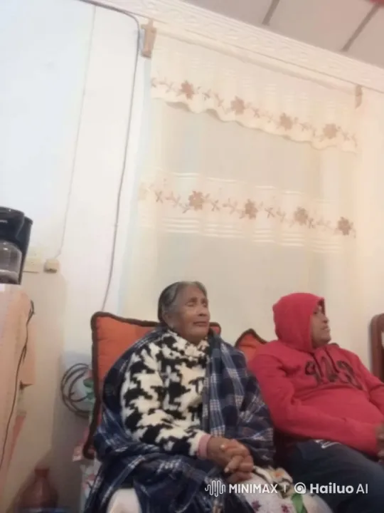 Elderly Woman and Man Share Silent Tears on Couch – AI Generated Video | Hailuo AI