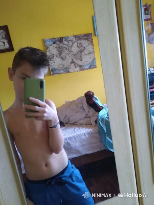 Young Individual Takes and Throws Selfie in Front of Mirror – AI Generated Video | Hailuo AI