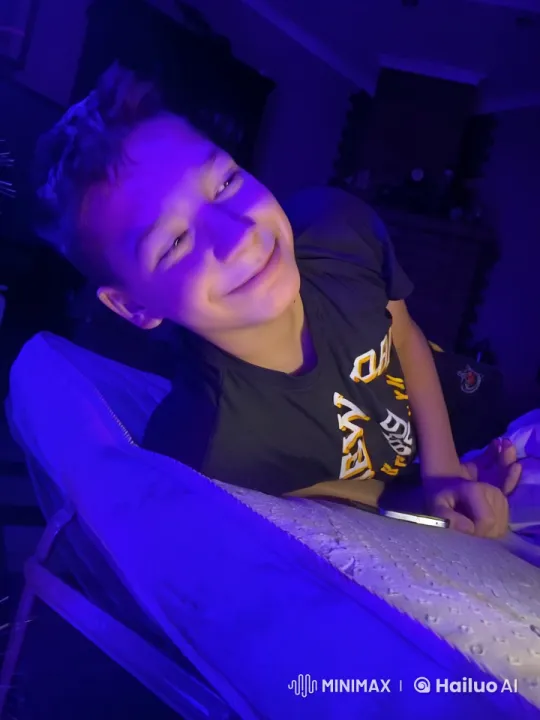 Boy and Dog Playfully Tussle on Bed – AI Generated Video | Hailuo AI