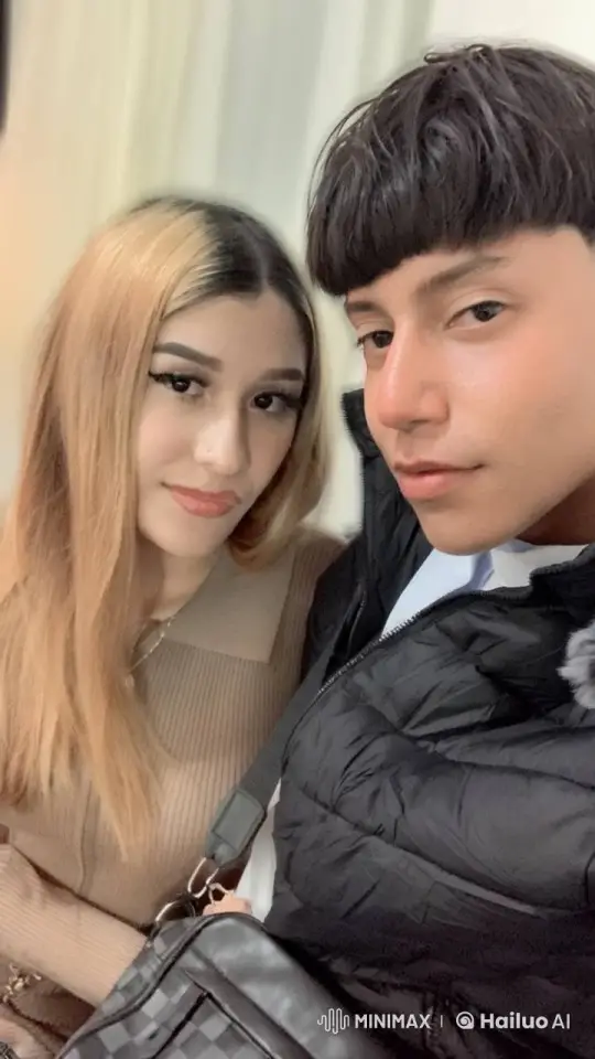 Closely Seated Couple Sharing a Tender Kiss – AI Generated Video | Hailuo AI