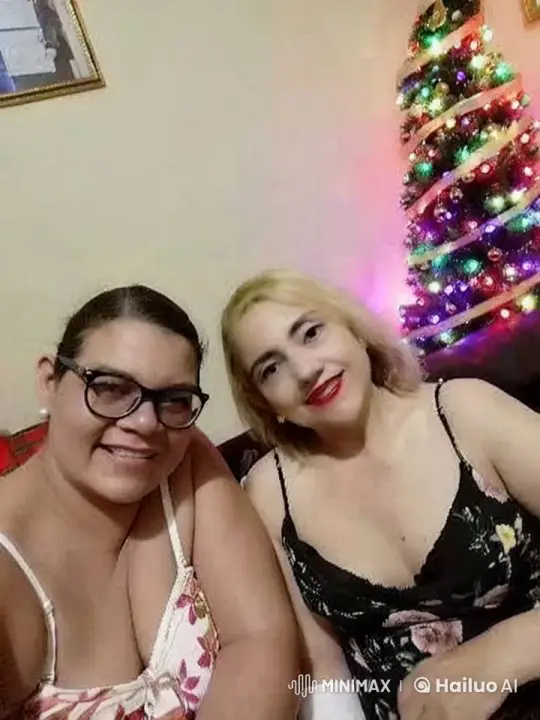Christmas Cheer: Two Women Share Joyful Embrace – AI Generated Video | Hailuo AI
