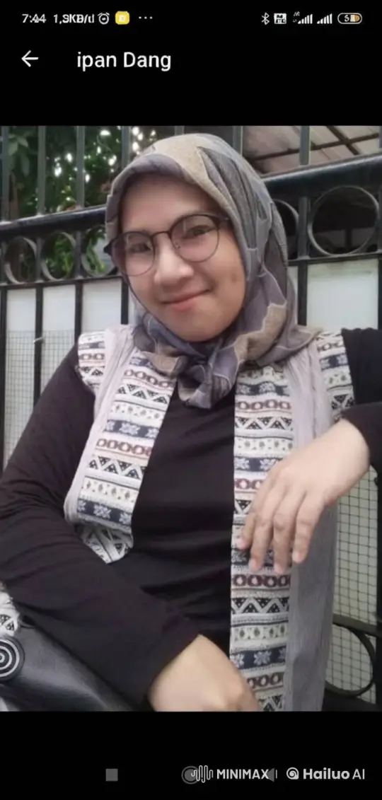 Woman in Hijab Smiles Gently at Camera – AI Generated Video | Hailuo AI