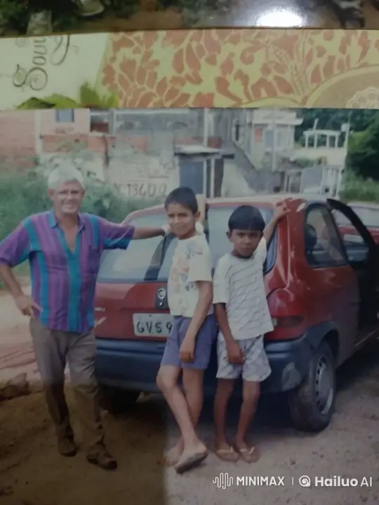 Silver-haired Man and Boys by Red Car in Daylight – AI Generated Video | Hailuo AI