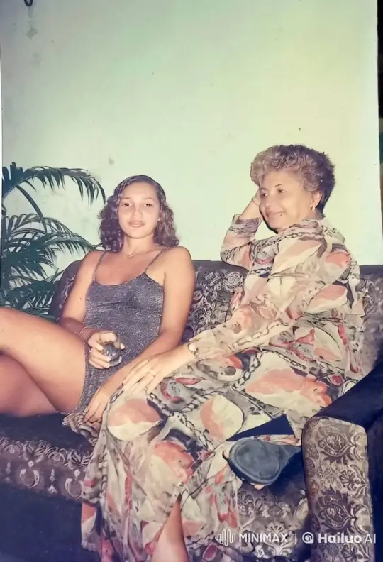 Two Individuals Relaxing on a Sofa – AI Generated Video | Hailuo AI