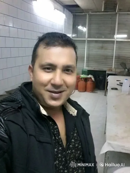 Friendly Man Expresses Love in Well-Lit Kitchen Setting – AI Generated Video | Hailuo AI