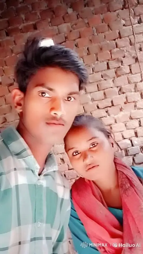 Young Couple Shares Tender Moment in Front of Brick Wall – AI Generated Video | Hailuo AI