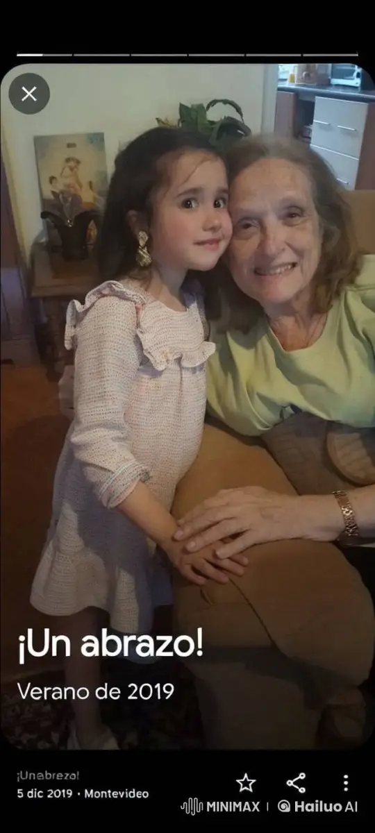 Elderly Woman and Young Girl Embrace in Cozy Montevideo Home – AI Generated Video | Hailuo AI