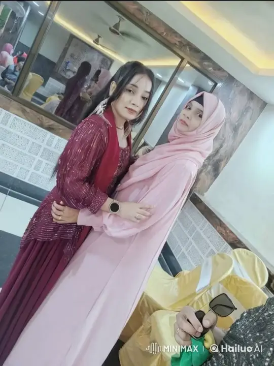 Affectionate Moment Between Two Women in Bright Room – AI Generated Video | Hailuo AI