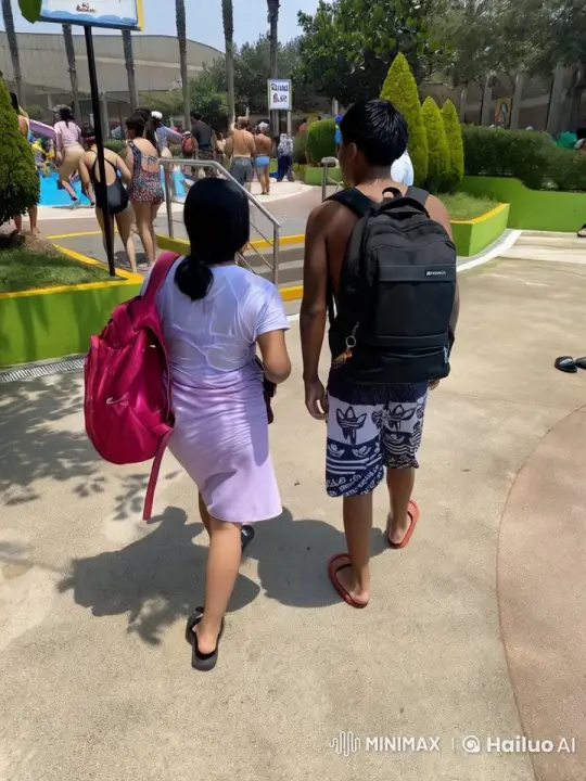 Boy and Girl Share Intimate Moment at Water Park – AI Generated Video | Hailuo AI