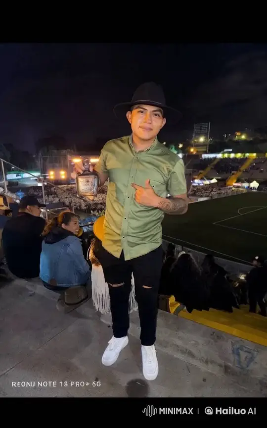 Young Man Enjoying Nighttime Stadium Event – AI Generated Video | Hailuo AI