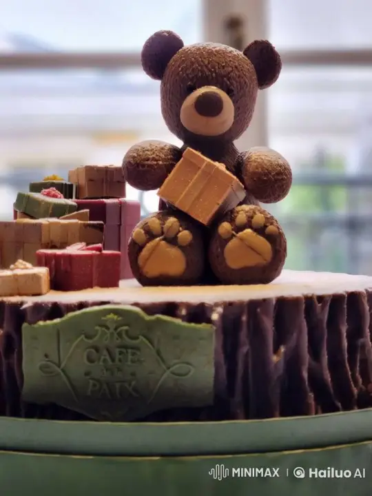 Chocolate Teddy Bear Delivers Gift at Cafe de la Paix – AI Generated Video | Hailuo AI