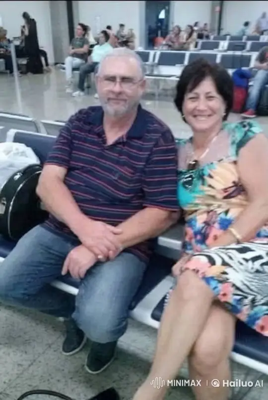 Couple Enjoying Airport Wait, Woman Showcases Dress – AI Generated Video | Hailuo AI