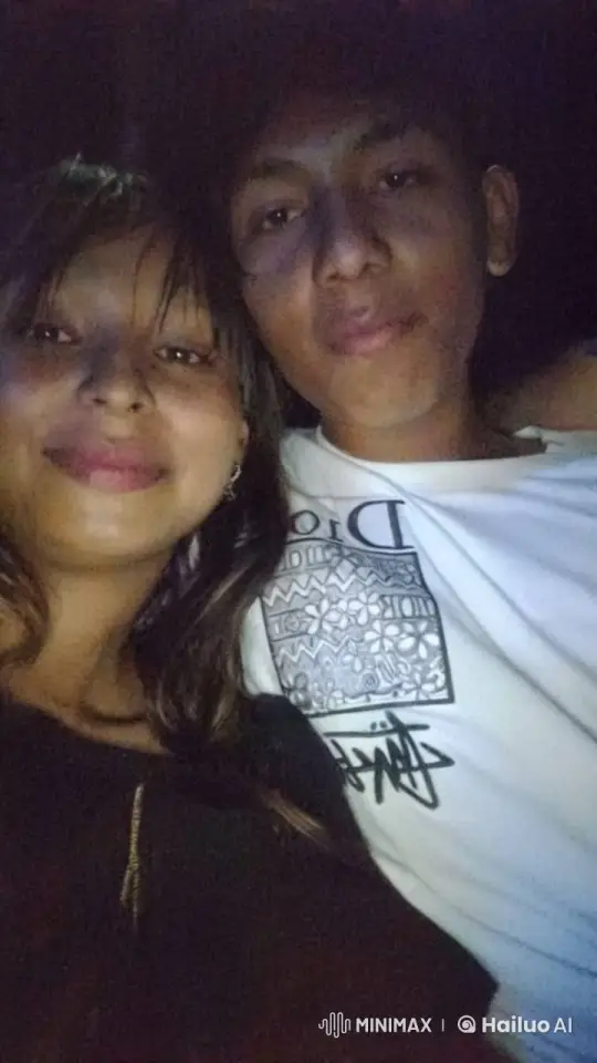 Two Individuals Share Intimate Moment in Dim Setting – AI Generated Video | Hailuo AI