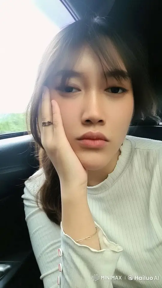 Young Woman Enjoying Serene Moment by Car Window – AI Generated Video | Hailuo AI