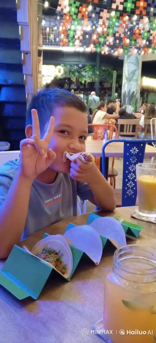Boy Enjoying Taco Surprised by Affectionate Moment – AI Generated Video | Hailuo AI