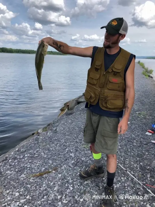 Angler Kisses His Catch on Tranquil Lakeside – AI Generated Video | Hailuo AI