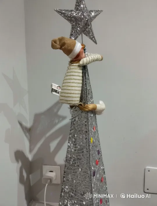 Elf Doll Dances Down Sparkly Christmas Tree – AI Generated Video | Hailuo AI