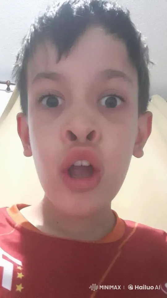 Boy Mimics Baldness with Playful Hair Trick – AI Generated Video | Hailuo AI