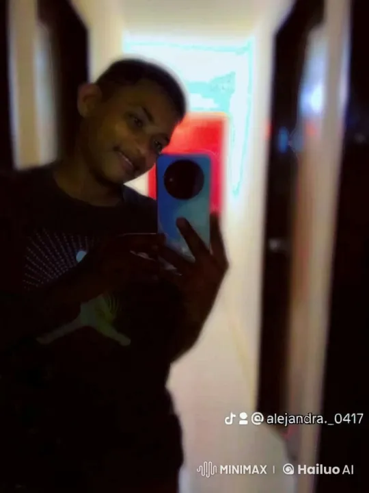 Person Taking Selfie in Hallway with Soft Light – AI Generated Video | Hailuo AI