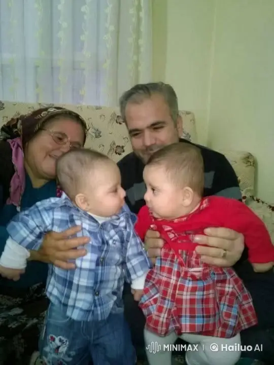 Family Harmony: Two Adults and Two Babies Enjoying a Cozy Moment – AI Generated Video | Hailuo AI