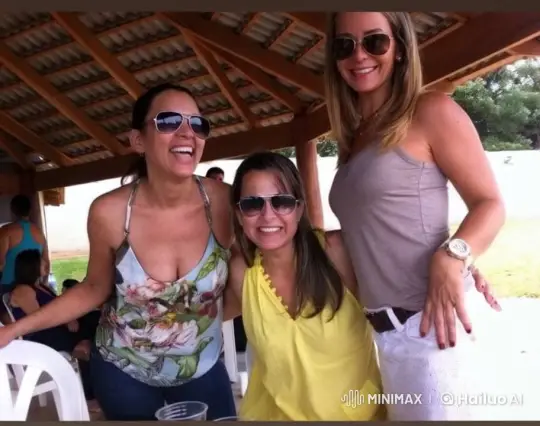 Women Share Laughter and Friendship in Pavilion – AI Generated Video | Hailuo AI