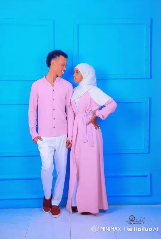 Couple in Pink Attire Share a Gentle Kiss in Live2D Animation – AI Generated Video | Hailuo AI